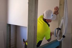 Drywall Repair worker doing drywall installation